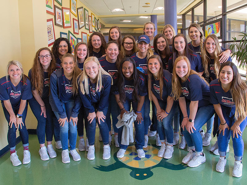 Ole Miss softball players paid a visit to Batson Children's Hospital Tuesday on their way to a game against Southeast Louisiana State in Hammond, Louisiana.