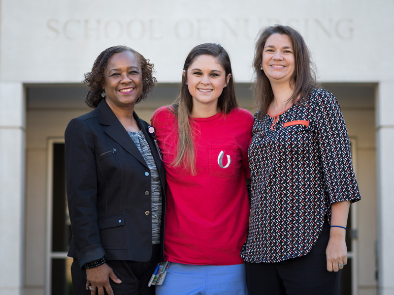 Lauryn Mendrop, center, asked Dr. LaDonna Northington, left, and Dr. Josie Bidwell to compete in Over the Edge, a Friends of Children's Hospital fundraiser.