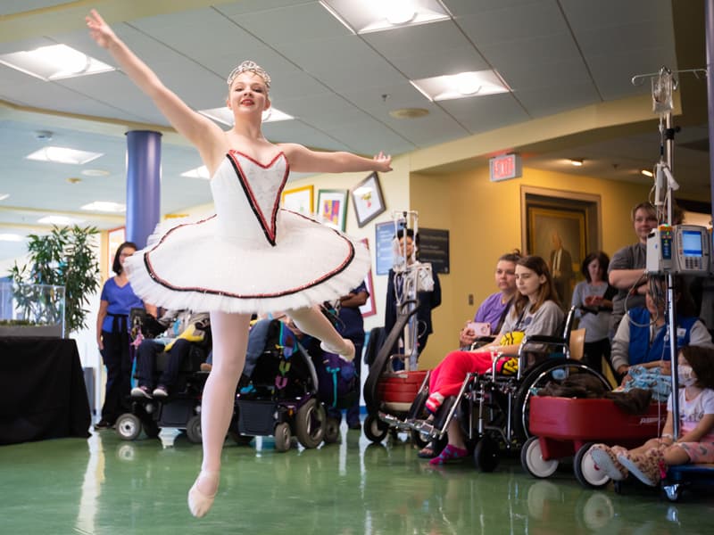 Josie Nasekos of Clinton leaps during a performance for Batson Children's Hospital patients. Dance, music and art are part of learning labs in the hospital school.