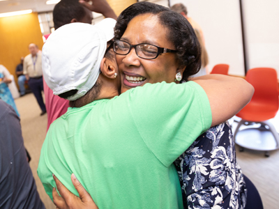 Triplett received many hugs during her retirement reception. She has made many friends in the past 44 years.