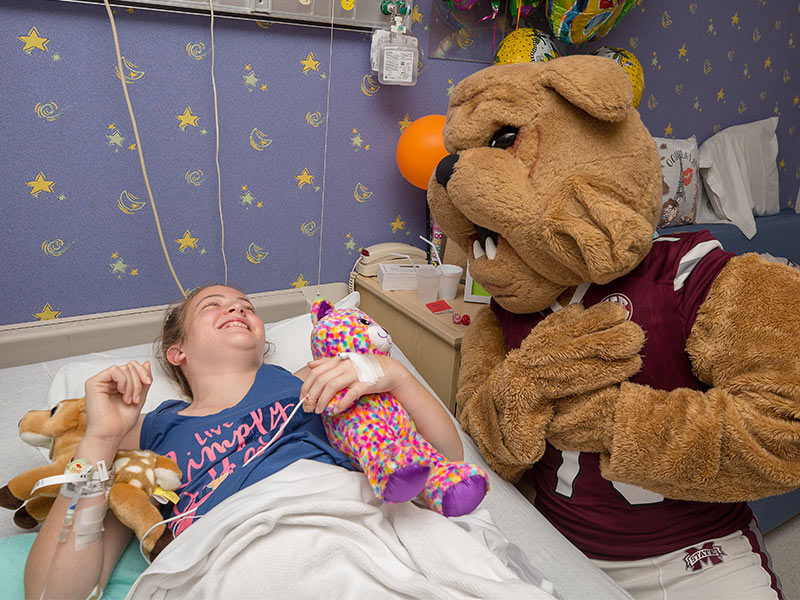 Mississippi State coach, players cheer on Batson patients