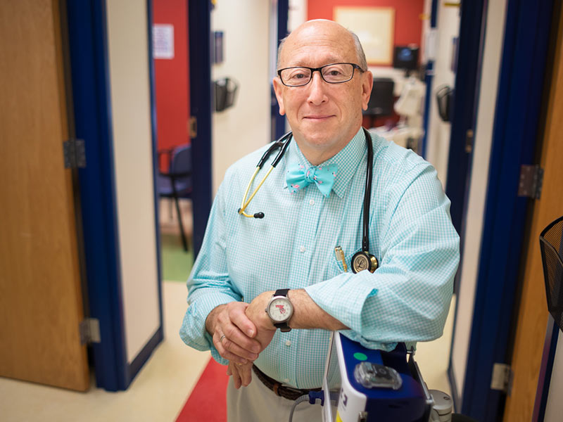 Dr. William Moskowitz, chief of pediatric cardiology and director of the Children's Heart Center at Batson Children's Hospital, takes a break from seeing patients at the Eli Manning Clinics for Children.