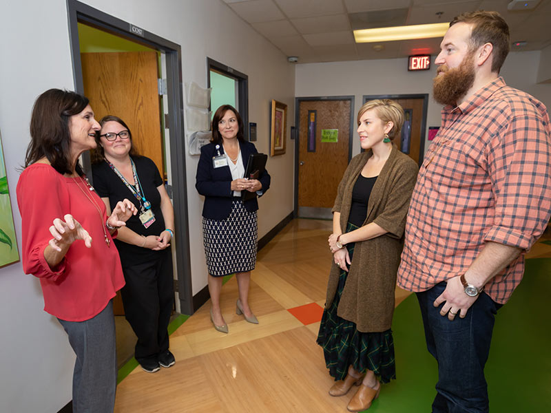 From left, Anita Vanderford, Ashley Prendez and Dr. Mary Taylor give Erin and Ben Napier, hosts of HGTV's 