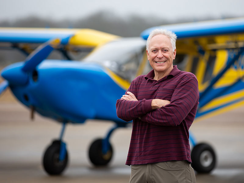Dr. Gary Reeves stands in front of the Zenair 801 that took him about 10 months to rebuild.