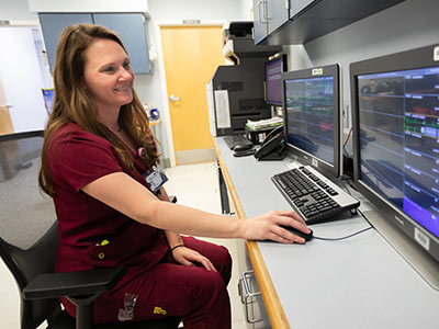Jennifer Brooks, UMMC Grenada nurse, uses a new telemetry system on a hospital floor.