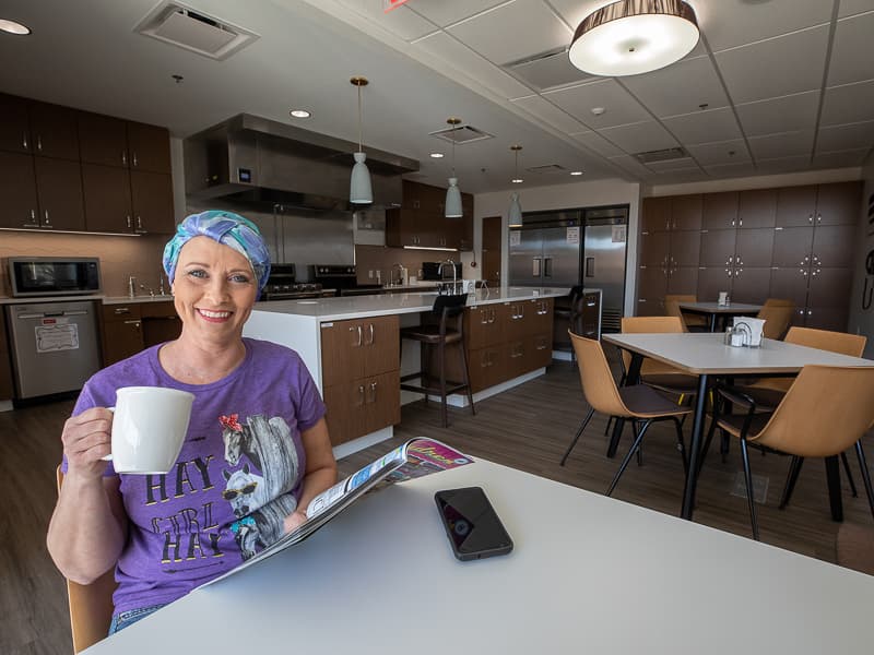 Misty Hall of Houston, a UMMC Cancer Institute patient, pauses for a quick hot drink in the Hope Lodge's kitchen and eating area after finishing her appointments for the day.