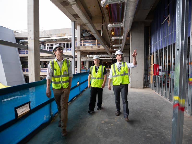 Checking the children's hospital expansion project's progress are, from left, Nate McKenney, construction coordinator; Wesley Smith, nurse manager; and Chris Collado, clinical liaison.