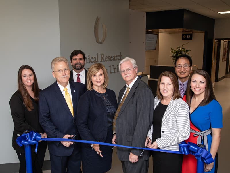 Participating in the CRTU's ribbon-cutting are, from left, Heather Vaughn, Dr. Gailen Marshall, Dr. Josh Gladden, Dr. LouAnn Woodward, Dr. Richard Summers, Jennifer Weis, Dr. Shou-Ching Tang and Leslie Musshafen.