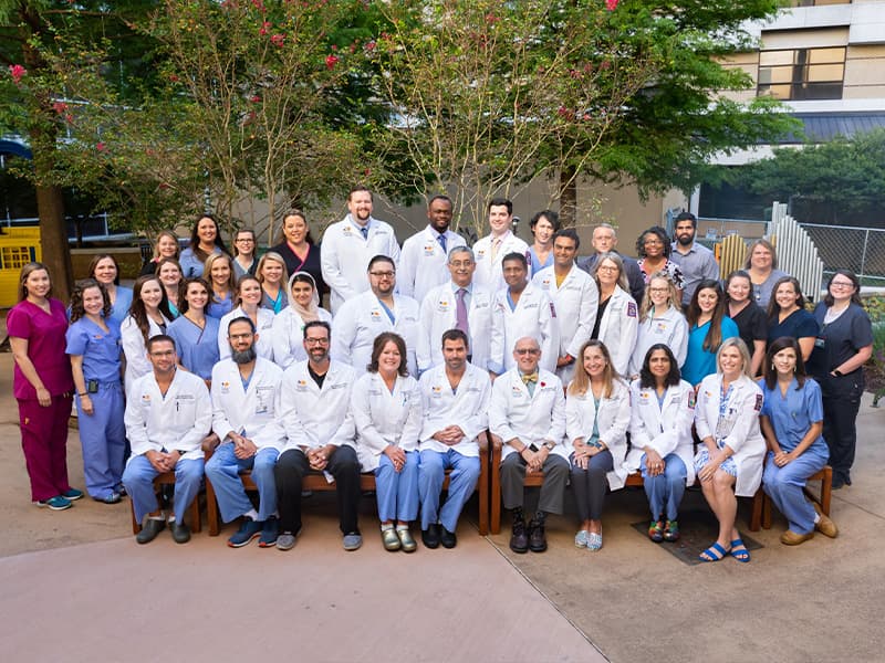 The Children’s Heart Center at UMMC has never before had so many experts caring for young cardiology patients. The team stopped in the Rainbow Garden for a photo this summer.