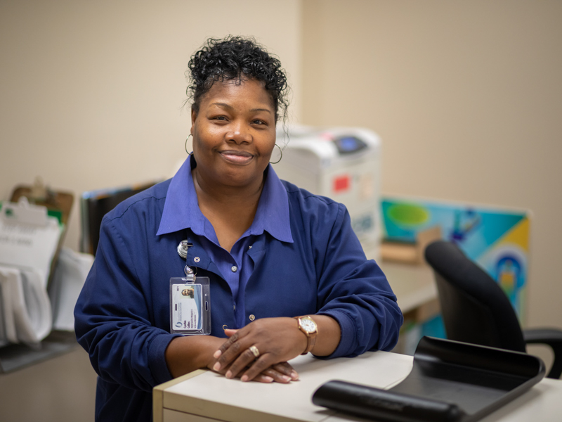 Cynthia Collins, a patient access specialist, greets all comers with a smile at Mammography Imaging.