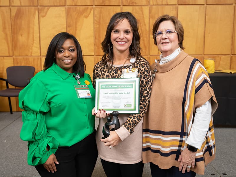 From left, Patrice Donald, magnet program manager in the Office of Nursing Quality and Development; LeAnn Harcharik, 4 Wiser nurse manager and DAISY Nurse Leader Award winner; and Terri Gillespie, chief nursing executive and clinical services officer for the UMMC Health System.