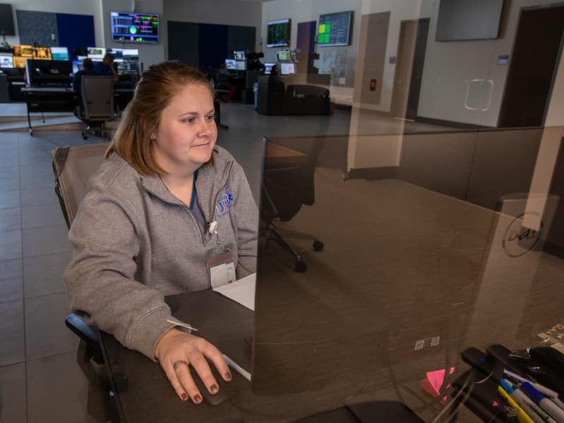 Lauren Aycock, communications specialist, works in Mississippi Center for Emergency Services' new home.