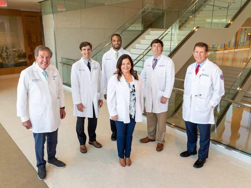 Kitt Bailey, front, an OCH nurse practitioner, is seeing patients at Oktibbeha County Hospital along with University Heart cardiologists, from left, Dr. Bryan Barksdale, Dr. Trey Clark, Dr. James Pollard, Dr. Michael Hall and Dr. Mike McMullan.