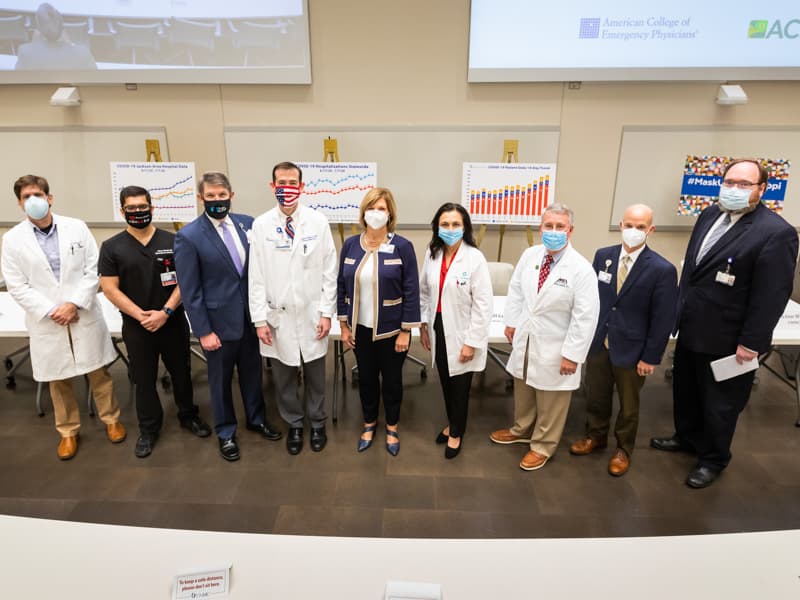 Among participants in a July 9 news conference to discuss COVID-19 concerns are, from left, Dr. Thomas Dobbs, Dr. Utsav Nandi, Dr. Clay Hays, Dr. Calvin Thigpen, Woodward, Dr. Anita Henderson, Dr. Bill Grantham, Dr. Alan Jones and Dr. Jonathan Wilson.