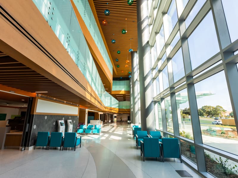 The spacious lobby of the Kathy and Joe Sanderson Tower at Children's of Mississippi includes amenities such as a gift shop and a coffee shop.