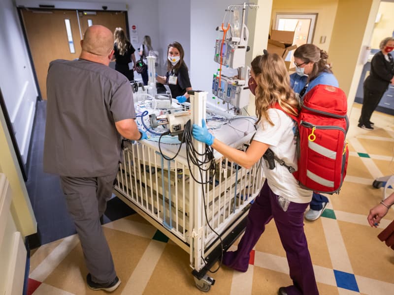 In moves that have been rehearsed for months, medical teams escorted patients from the Batson PICU to the pediatric intensive care floor at the Kathy and Joe Sanderson Tower.