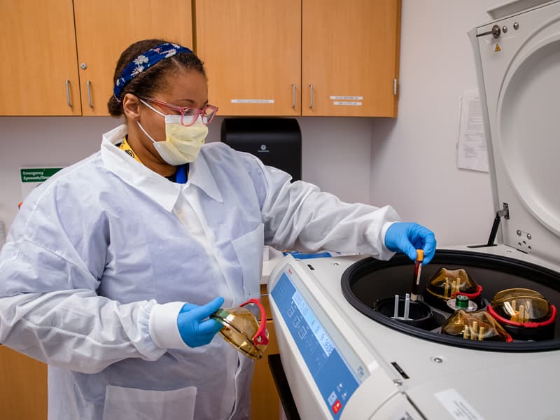 Research specialist Savannah Vann processes samples in the Clinical Research Trials Unit.