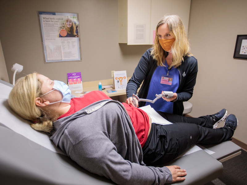 At her clinic in Brookhaven, Dr. Carolita Heritage, an obstetrician-gynecologist, examines Jessica Holmes of Liberty, who is also a sonographer at the clinic. “There is always a need for primary physicians here,