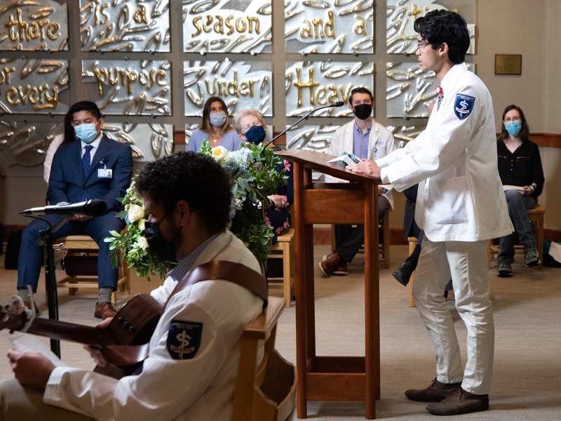 Moses Lam, first-year medical student at UMMC, speaks during a live stream ceremony of thanksgiving in memory of anatomical donors Tuesday, May 11, 2021.
