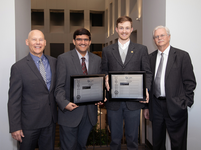 Cobb, second from right, and mentor Janorkar, second from left, were among the inventors recognized at UMMC's first intellectual property ceremony in 2019. Also pictured: UMMC Intellectual Property Director Dr. Jim Petell and Associate Vice Chancellor for Research Dr. Richard Summers.