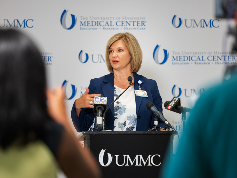 Dr. LouAnn Woodward, UMMC vice chancellor for health affairs and dean of the School of Medicine, explains the Medical Center's new COVID-19 vaccination policy to the media.
