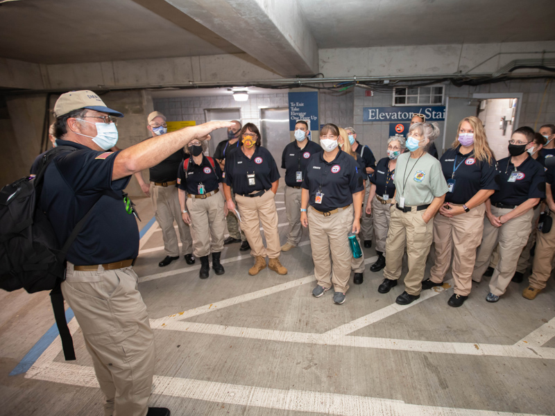 The federal medical team that's staffing the COVID-19 field hospital prepare for the facility's Friday opening.