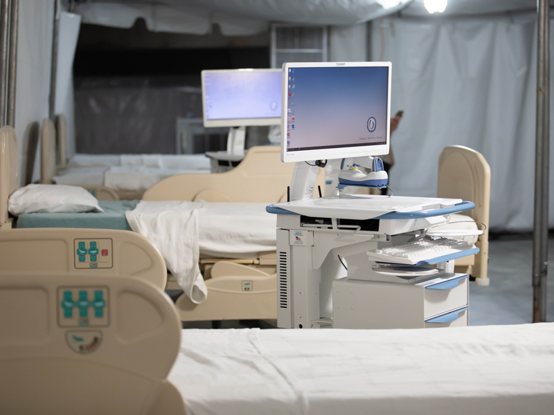 Care inside the COVID-19 field hospital includes electronic medical charts as well as supportive care such as oxygen and IV fluids.