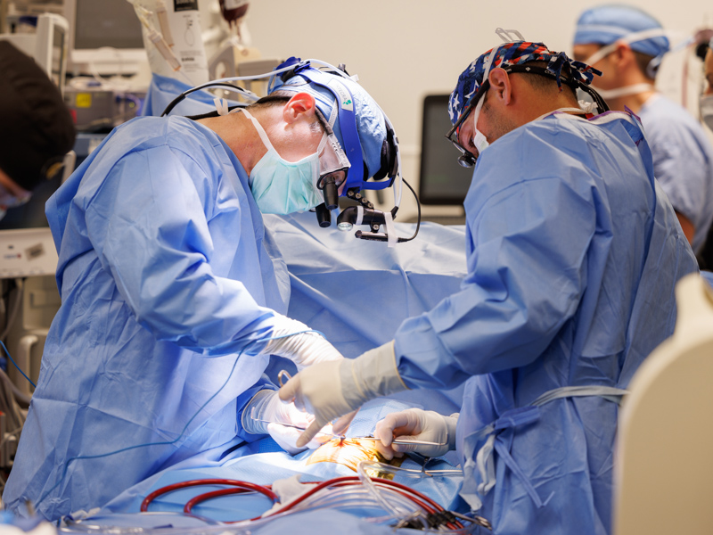 Dr. Phillip Burch, center, chief of pediatric cardiothoracic surgery, is shown during a procedure.