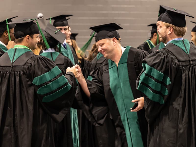 Graduation Pictures. University of Louisville. Big 4 bridge