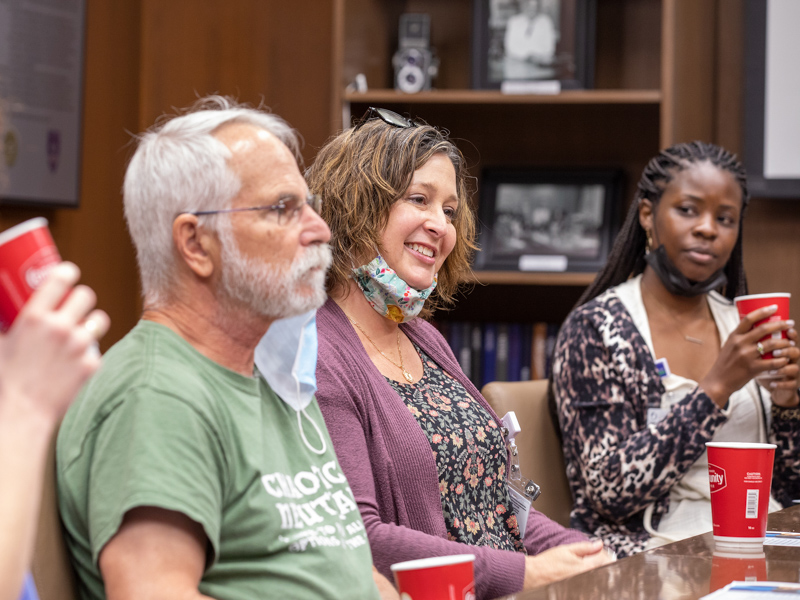 Employees Alyssa McCarron, Dr. David Brown, Kimberly Brown and Iesha Smith practice mindfulness during a meditation session hosted by the Office of Well-being. Jay Ferchaud/ UMMC Communications 