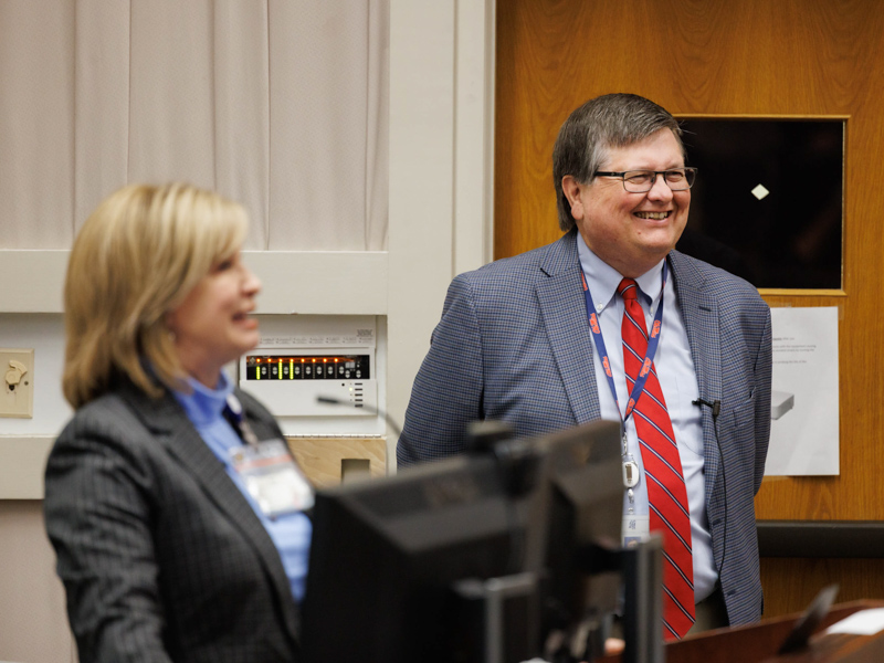 State Health Officer Dr. Daniel Edney, left, is  introduced by Dr. LouAnn Woodward, vice chancellor for health affairs, before Edney's remarks to the Oct. 31 Vice Chancellor's Lecture Series.  Joe Ellis/ UMMC Communications
