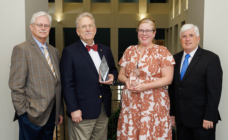 Dr. Gailen Marshall Jr., second from left, and Dr. Charlotte Hobbs, are recipients of the Richard L. Summers Outstanding Achievement in Clinical Research Award. Summers is left.
