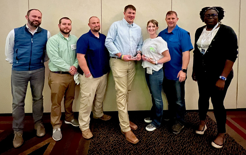 Those accepting the Circle of Excellence award include, from left, Dr. Matthew Kutcher, a trauma surgeon and assistant professor of surgery; trauma management registered nurse educator Kendall Wilcher; AirCare critical care paramedic Ben White; Mississippi Center for Emergency Services critical care transport educator Will Appleby; AirCare flight registered nurses Shyann King and Kevin King; and Dr. Chinenye Iwuchukwu, a trauma surgeon and assistant professor of surgery.