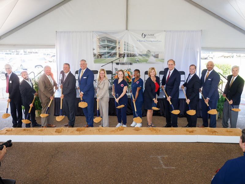 Breaking ground on the new UMMC School of Nursing are, from left, Dr. Scott Rodgers, associate vice chancellor for academic affairs; Dr. Michael Parnell, UMMC School of Nursing Alumni Association president; Rep. John Read; Rep. Jason White; House Speaker Philip Gunn; Dr. Tina Martin, interim dean of the School of Nursing; nursing students Rayne Jensen and Amari Reginal; Dr. LouAnn Woodward, vice chancellor for health affairs and dean of the School of Medicine; Lt. Gov. Delbert Hosemann; U.S. Rep. Michael Guest; Higher Education Commissioner Dr. Alfred Rankins Jr.; and architect Jim Eley, principal of Eley Guild Hardy Architects. Joe Ellis/ UMMC Communications 