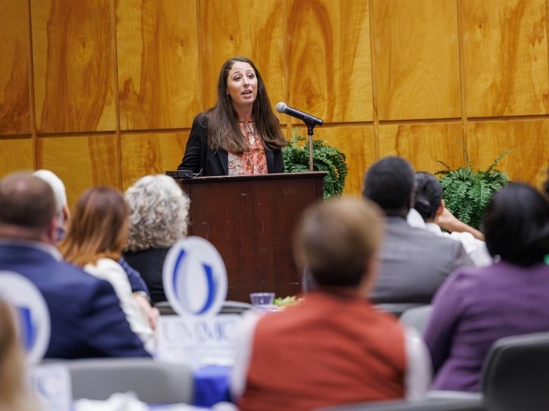 Faulkner addresses attendees of the Distinguished Alumni Ceremony and Luncheon. Melanie Thortis/ UMMC Communications 