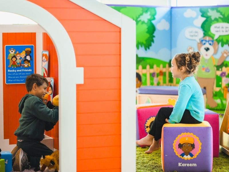 Children's of Mississippi patient Luke Starkey of Clinton puts on a puppet show for Avah Davis of Meadville.