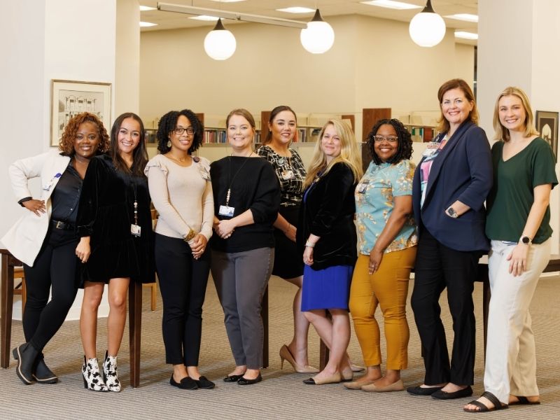 Office of Enrollment Management, from left, Candice Brent, Nikki Hubbard, Brittney Anthony, Nicole Nichols, Nicole Connolly, Lauren Nichols, Tameshia Bankhead, Dr. Emily Cole and Mary Bess Skinner.