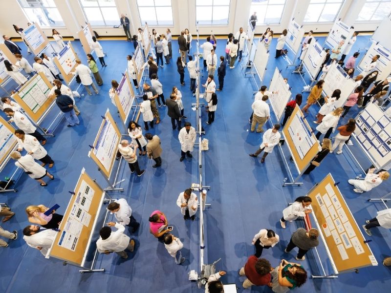 SGSHS students fill the Norman G. Nelson Student Union gymnasium with their poster presentations during the school's annual Research Day in October. Melanie Thortis/ UMMC Communications