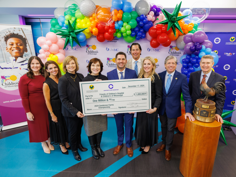 Celebrating the $1 million donation from Century Club Charities to Friends of Children's Hospital are, from left, Caitlin Foreman, executive director of Friends of Children's Hospital; Hilary Burroughs, vice president of marketing at Wayne-Sanderson Farms; Dr. LouAnn Woodward, vice chancellor for health affairs at UMMC; Dr. Mary Taylor, Suzan B. Thames Chair and professor of pediatrics; David Gadd, senior vice president at Wayne-Sanderson Farms and general manager of the company's retail business unit; Dr. JR Woodall, president of Century Club Charities; Kristin Allen, board chair of Friends of Children's Hospital; Steve Jent, executive director of the Sanderson Farms Championship; and Dr. Guy Giesecke, CEO of Children's of Mississippi.