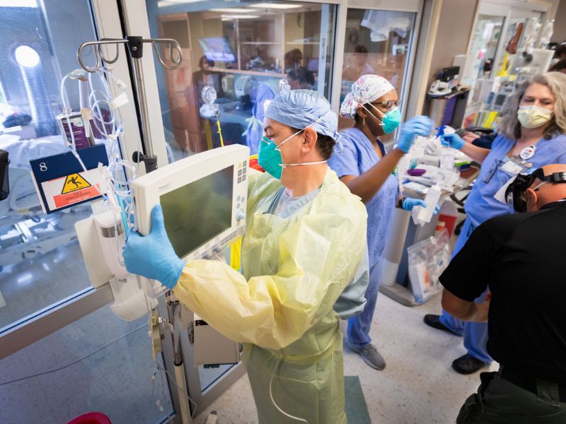 Recalling dedication of the respiratory therapists at UMMC, Dr. Andy Wilhelm said, "Everyone of them raised their hand when it was their turn. I don't know how many steps they got in every day." Among them, shown in this 2020 file photo, is David Mitchell, who's checking the ventilator of an ICU patient with COVID-19.