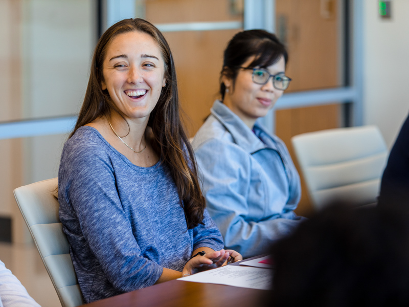 Taylor Lefler enjoyed working closely with other graduates during her School of Population Health PhD biostatistics and data science studies as seen in this 2022 photo during a student body meeting.