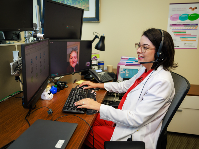 UMMC’s maternal telehealth program has provided support to more than 100 expectant mothers across the state. RN care coordinator Tiffany Regan regularly connects with patients like Lauren Black, pictured above, throughout their pregnancy and postpartum period.
