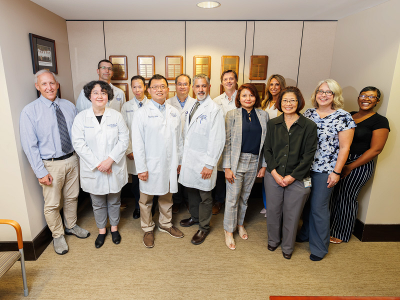 Helping with the COBRE BARC, faculty and staff in the Department of Otolaryngology - Head and Neck Surgery, from left, front row: Dr. Douglas Vetter, associate professor; Dr. Hong Zu, professor; Dr. Wu Zhou, professor; Dr. Rakesh Chandra, department chair; Dr. Sumana Ghosh, assistant professor; Kathleen Yee, associate professor; Dr. Donna Platt, director of the Division of Neurobiology and Human Behavior; Nekeisha Johnson, grant accounting manager; back row: Dr. Brad Walters, associate professor; Dr. Keli Xu, associate professor of cell and molecular biology; Sung-Ho Huh, assistant professor; Christopher Spankovich, professor; Hayley Hammon, department business administrator.