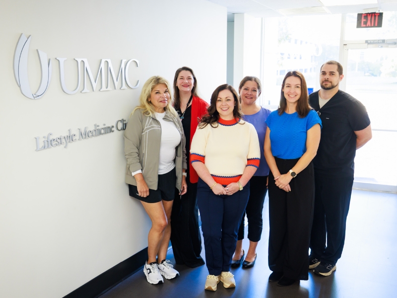 From left, patient Deborah Hall, Dr. Josie Bidwell, professor and clinical director of the Department of Preventive Medicine, Bethany Garner,  registered dietitian nutritionist, Lauren Turner, nurse practitioner, Melissa Wood, nurse practitioner and Tommy Berg, exercise physiologist.