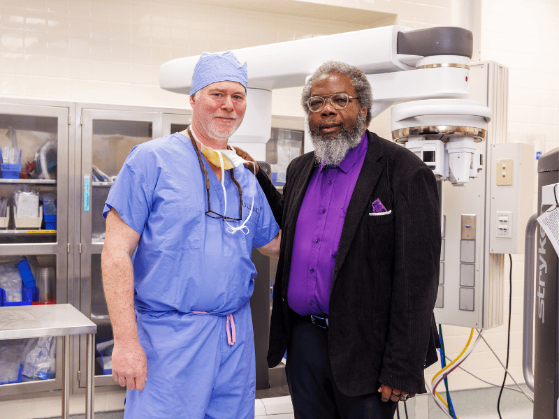 Dr. Stanley Smith, right, credits surgeon Dr. Chad Huckabay and CCRI care for successful treatment of his prostate cancer.