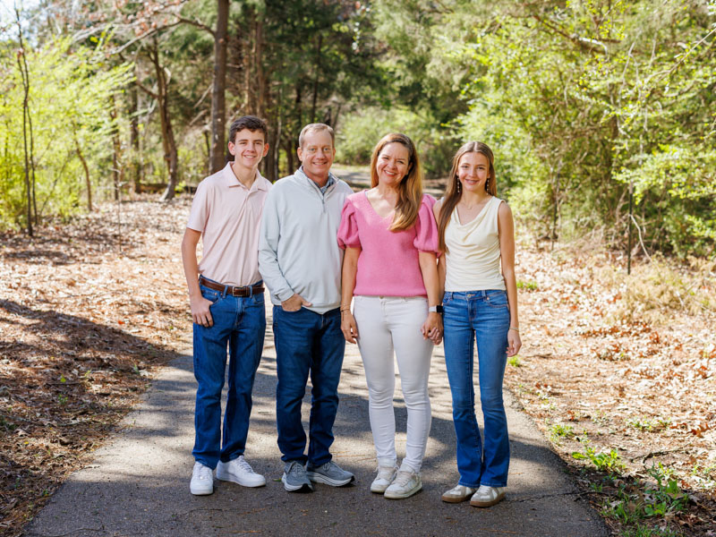 Wade Watts enjoys an afternoon outside with his family, from left, his son Everett, 16; his wife, Sara; and his daughter Chaney Claire, 13.