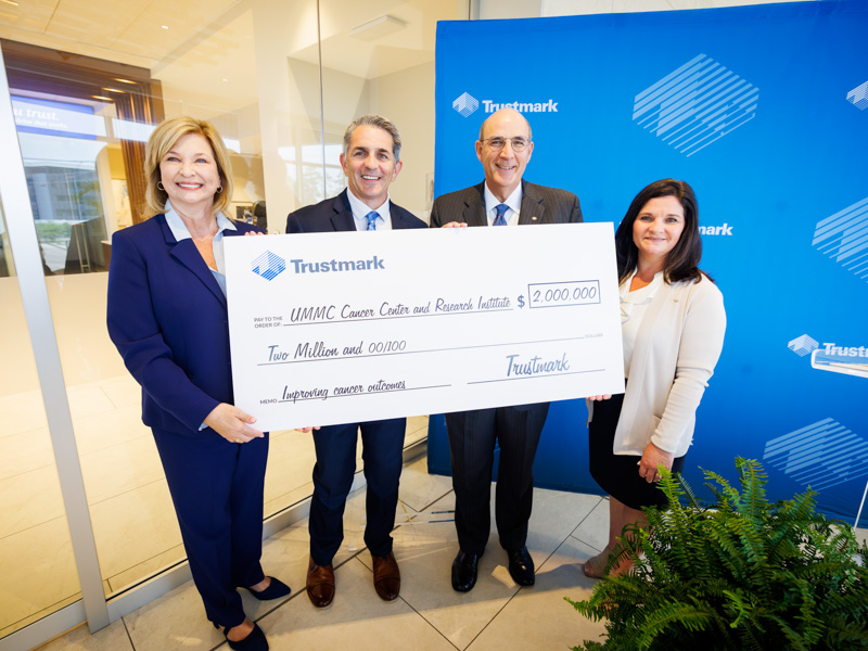 Celebrating Trustmark's $2 million gift to the CCRI campaign are, from left, Dr. LouAnn Woodward, vice chancellor for health affairs; Dr. Rod Rocconi, Ergon Chair for Cancer Research and director of the UMMC Cancer Center and Research Institute; Art Stevens, president of retail banking at Trustmark; and Melanie Morgan, executive vice president and director of corporate communications and marketing at Trustmark.