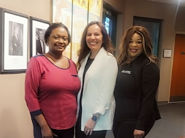 Chief Dr. RaShall Brackney, Michelle Brassfield and Johnnetta, an attendee.
