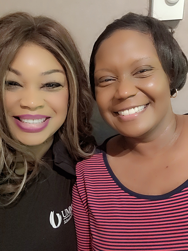 Michelle Brassfield takes a selfie with Johnnetta, an attendee.