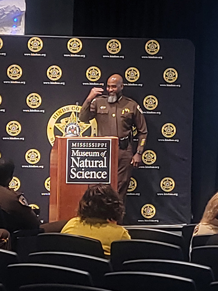 Sheriff Tyree Jones speaks to an audience.